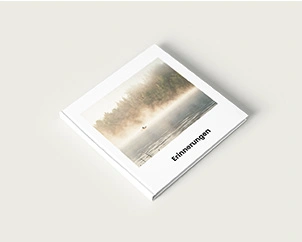 Geschlossenes Fotobuch mit Naturbildern